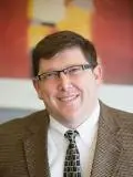 Dr. Karl Neuhaus, DDS