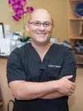 Dr. Arman Roksar, DDS