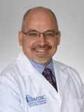 Dr. John Comisi, DDS