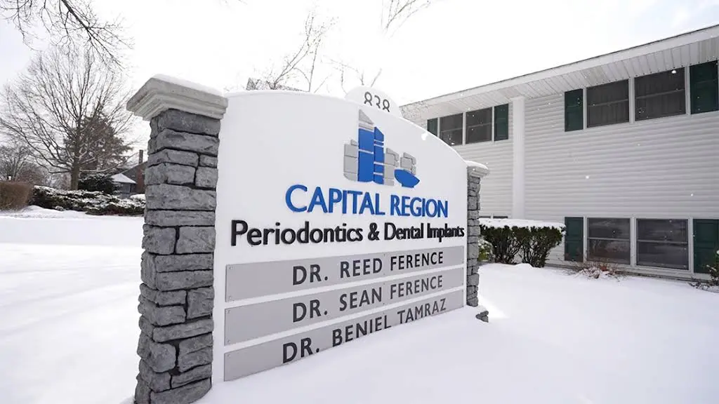 Capital Region Periodontics and Dental Implants - Professional dental clinic exterior with modern facilities