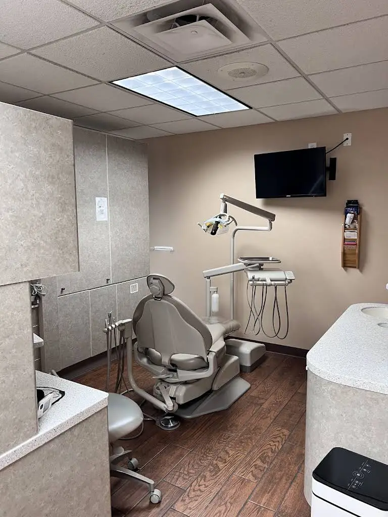 William E. Carroll, Jr., DDS, PC - Professional dental clinic exterior with modern facilities