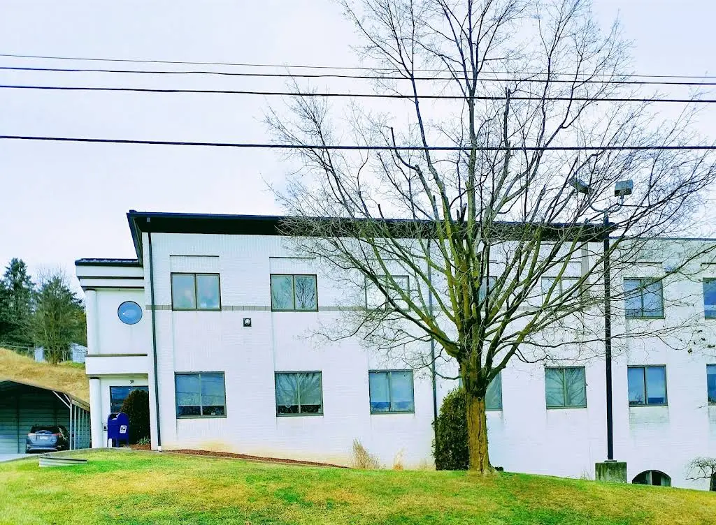 T. John Kuehn Family Dentistry - Professional dental clinic exterior with modern facilities