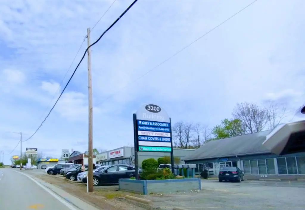 Grey & Associates Family Dentistry - Professional dental clinic exterior with modern facilities