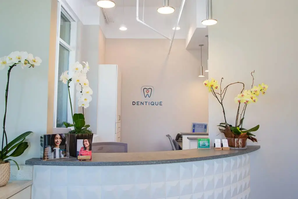 Dentique - Professional dental clinic exterior with modern facilities