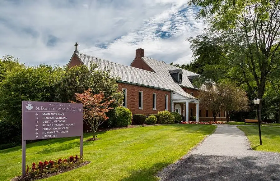 St. Barnabas Health System - Professional dental clinic exterior with modern facilities