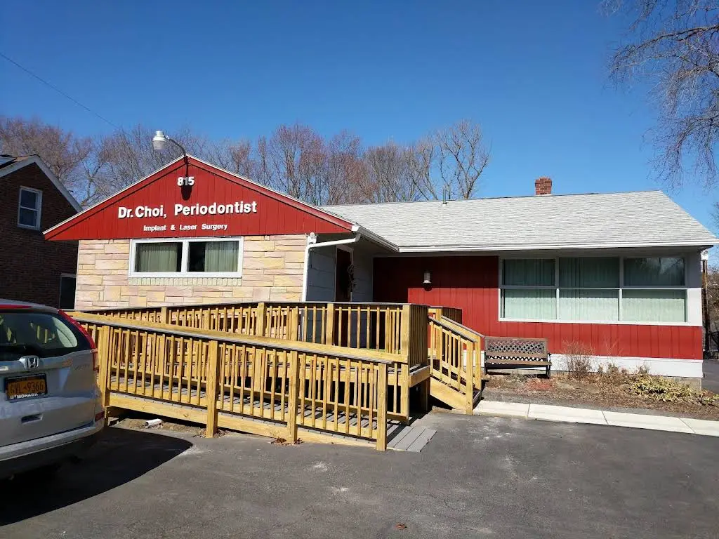 Latham Periodontics, PLLC / Gum and Implant - Professional dental clinic exterior with modern facilities