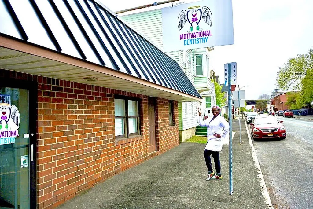 Motivational Dentistry - Professional dental clinic exterior with modern facilities