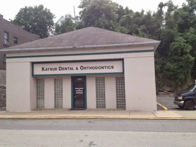 Katsur Dental & Orthodontics - Professional dental clinic exterior with modern facilities