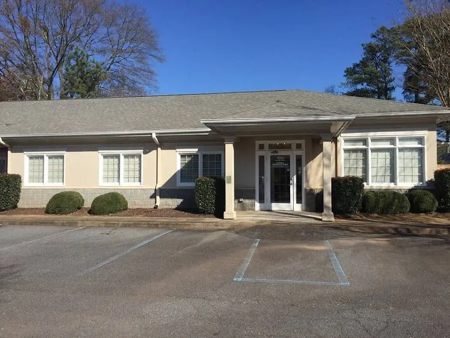Implant & Family Dentistry - Professional dental clinic exterior with modern facilities