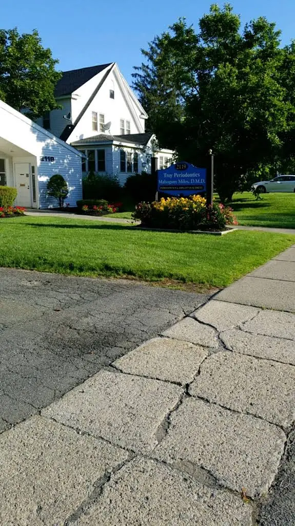 Troy Periodontics - Professional dental clinic exterior with modern facilities