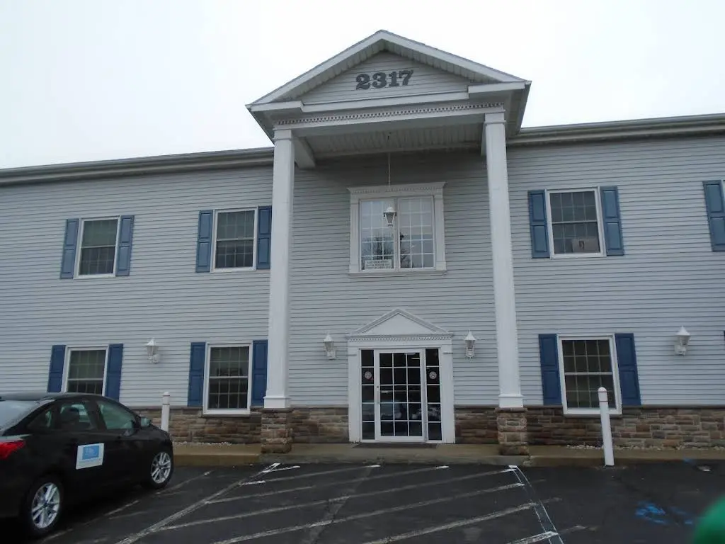 Capital District Endodontics, PC - Professional dental clinic exterior with modern facilities