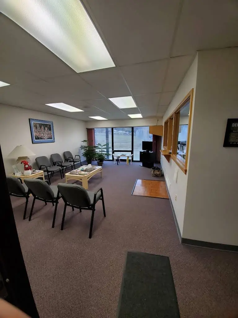 Sante Richard DDS - Professional dental clinic exterior with modern facilities