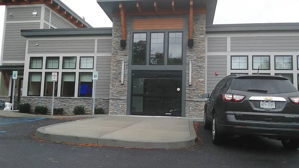 The Smile Lodge - Professional dental clinic exterior with modern facilities