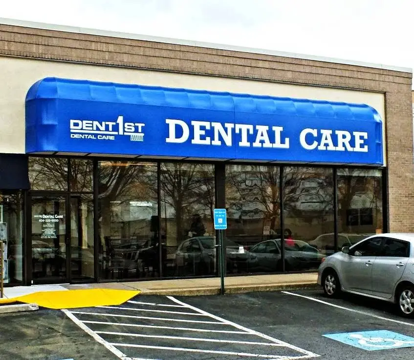 DentFirst Dental Care - Professional dental clinic exterior with modern facilities