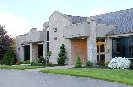 Progressive Dental Studio & Implant Center - Professional dental clinic exterior with modern facilities