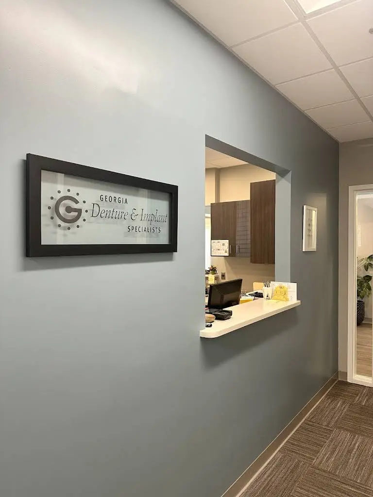 Georgia Denture & Implant Specialists - Professional dental clinic exterior with modern facilities