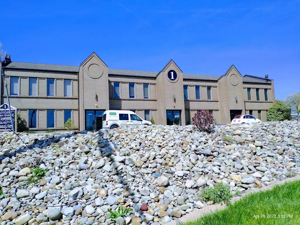 John A. Tollari, DMD - Family Dentistry - Professional dental clinic exterior with modern facilities