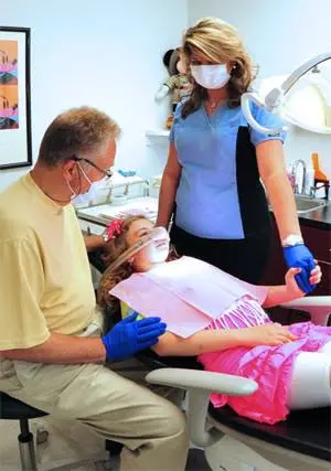 Dhaduk Pediatric Dentistry - Professional dental clinic exterior with modern facilities