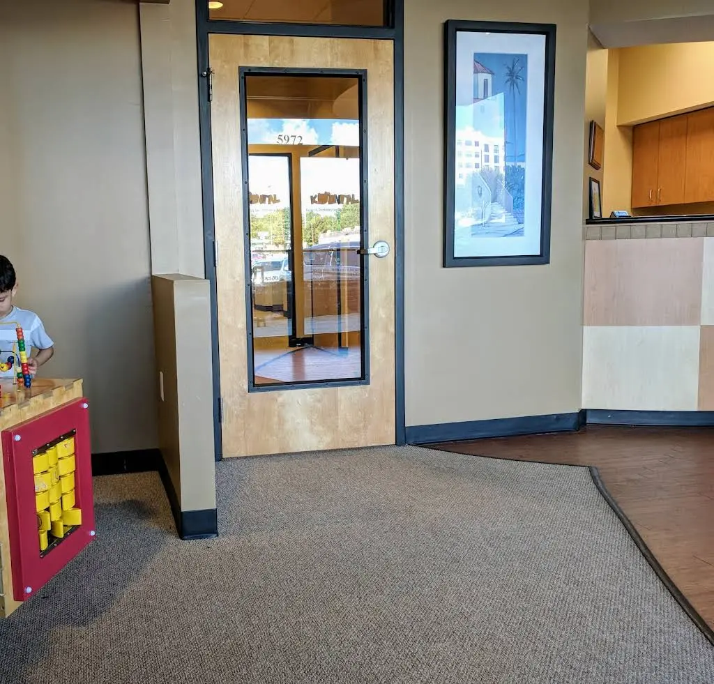 KiDental - Professional dental clinic exterior with modern facilities
