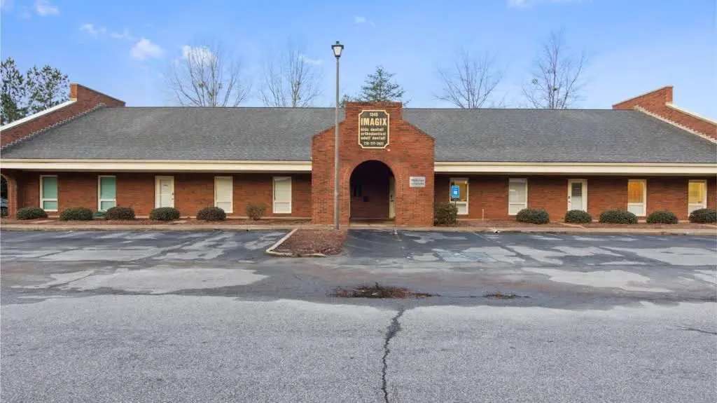 Imagix Dental - Professional dental clinic exterior with modern facilities