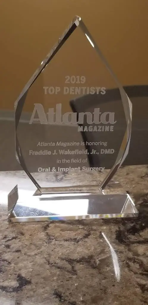 Associated Oral Specialties - Professional dental clinic exterior with modern facilities
