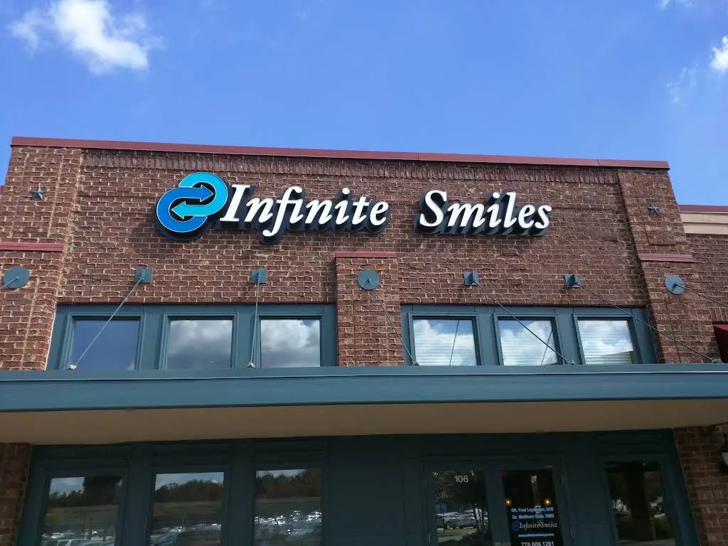 Infinite Smiles - Professional dental clinic exterior with modern facilities