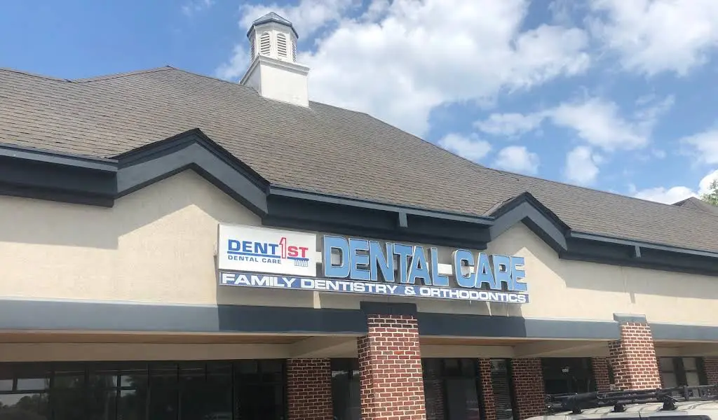 DentFirst Dental Care - Professional dental clinic exterior with modern facilities