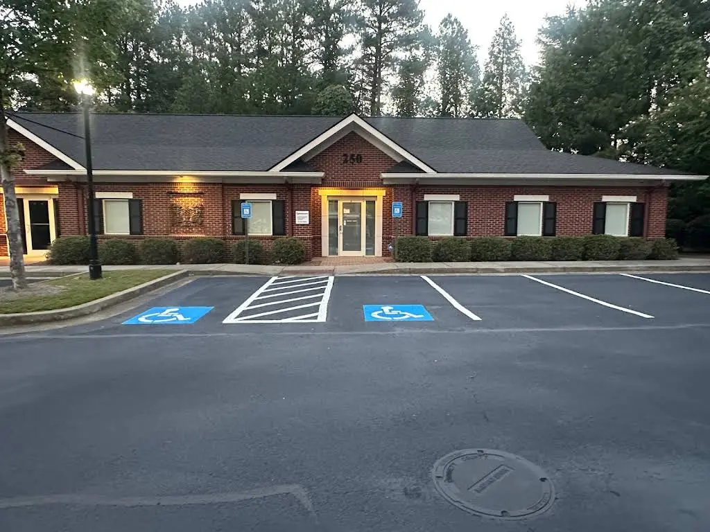 Rejuvenescence Oral & Facial Surgery, Dental Implants, and Cosmetics - Professional dental clinic exterior with modern facilities