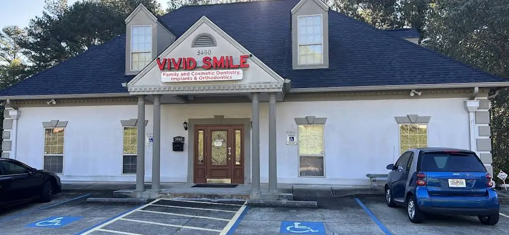 Vivid Smile Dental Center - Professional dental clinic exterior with modern facilities