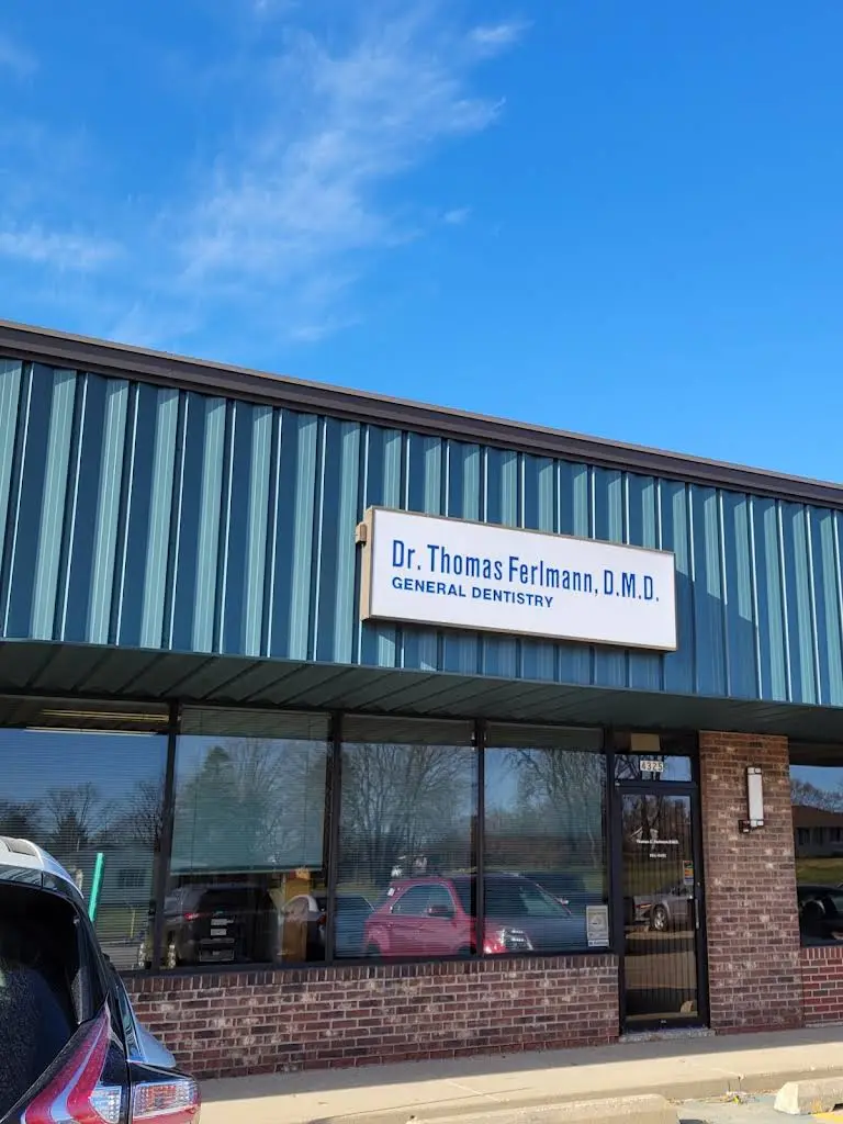 Thomas Ferlmann, DMD - Professional dental clinic exterior with modern facilities