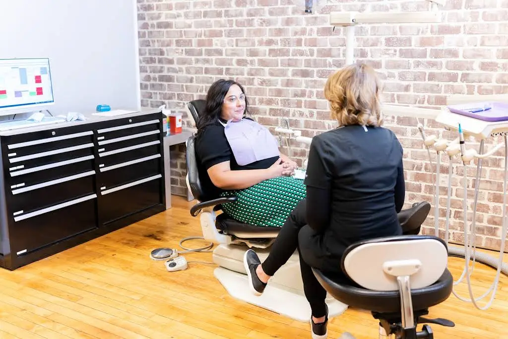 Happy Tooth - Professional dental clinic exterior with modern facilities