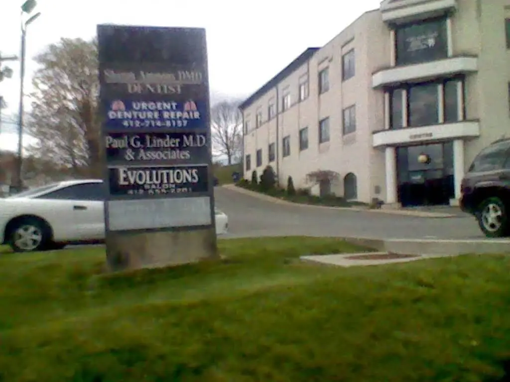 Urgent Denture Repair LLC - Professional dental clinic exterior with modern facilities