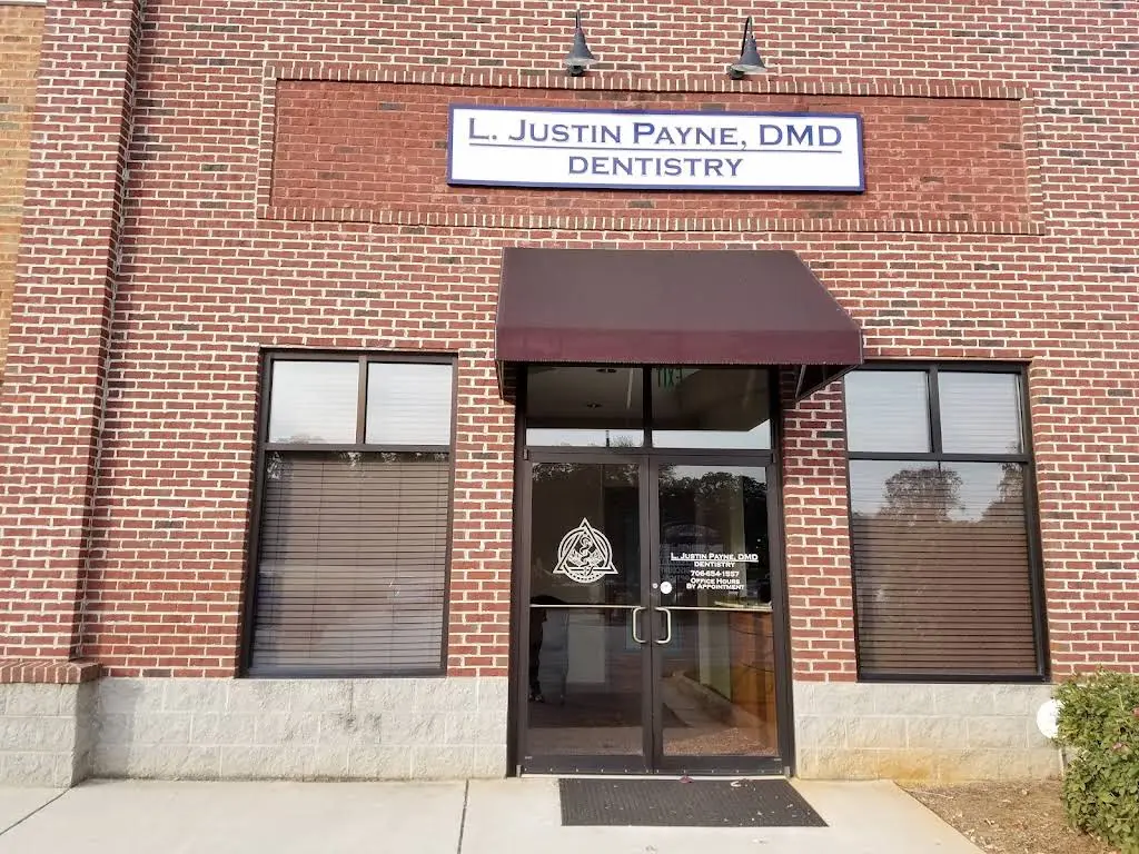 L. Justin Payne, DMD - Professional dental clinic exterior with modern facilities