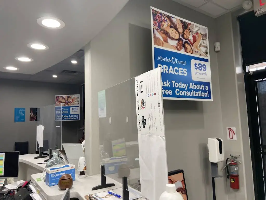 Absolute Dental - Professional dental clinic exterior with modern facilities
