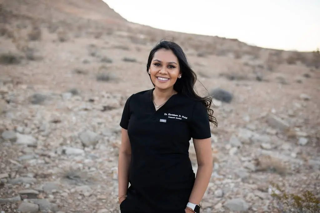 Desert Inn Smiles - Professional dental clinic exterior with modern facilities