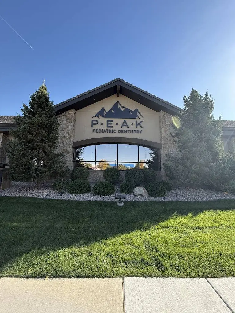 Peak Pediatric Dentistry - Professional dental clinic exterior with modern facilities