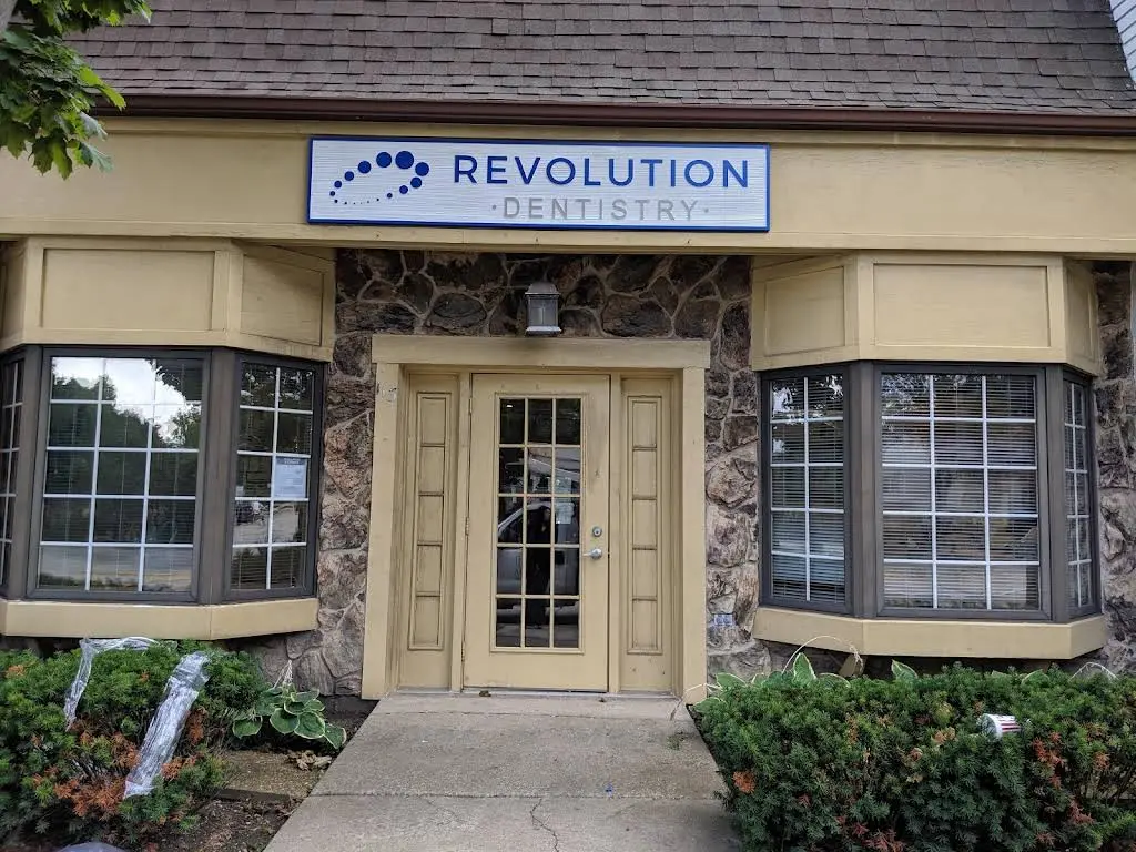 Revolution Dentistry - Professional dental clinic exterior with modern facilities