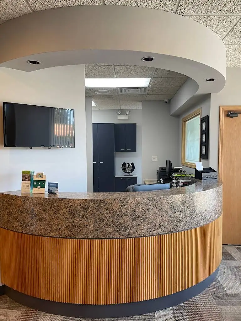 Corinium Dental - Professional dental clinic exterior with modern facilities