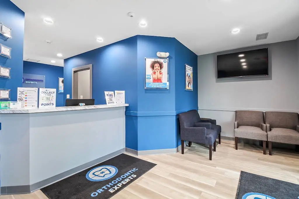 Orthodontic Experts - Professional dental clinic exterior with modern facilities