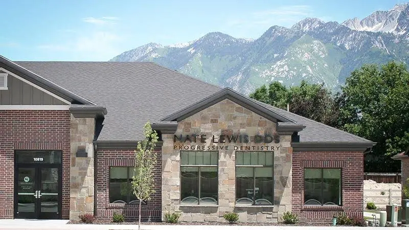 Nate Lewis DDS - Professional dental clinic exterior with modern facilities