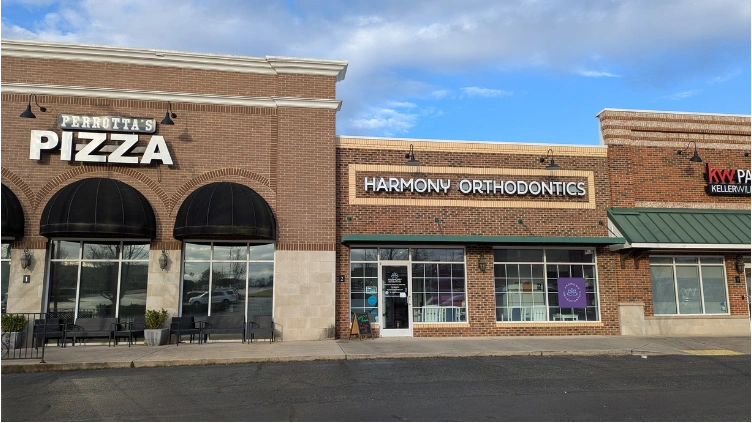 Harmony Orthodontics - Professional dental clinic exterior with modern facilities