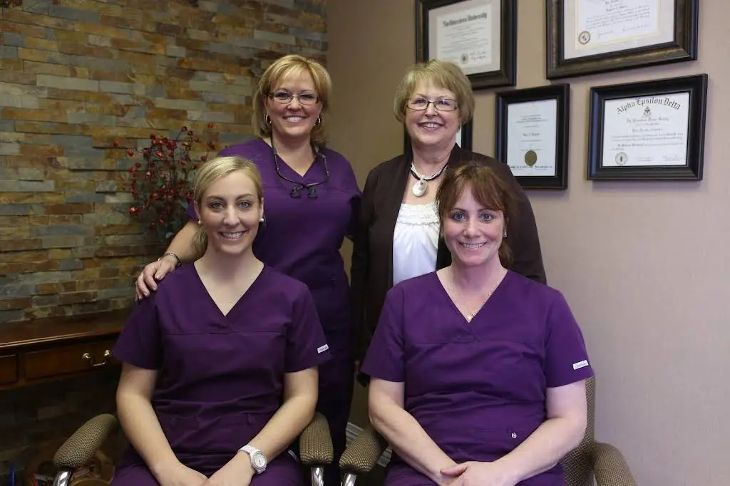 Kim Battisto, DDS - Professional dental clinic exterior with modern facilities