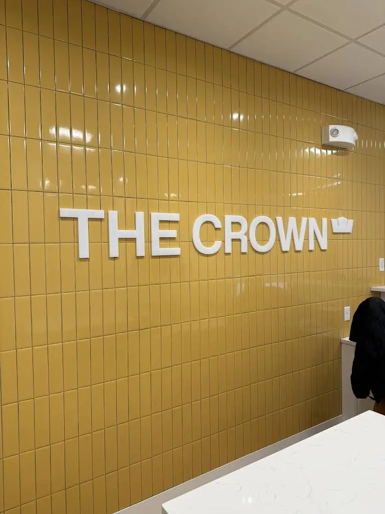 The Crown Dental Arts - Professional dental clinic exterior with modern facilities