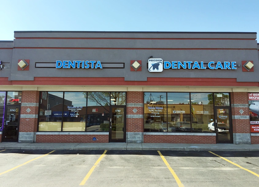 Precision Dental Care - Professional dental clinic exterior with modern facilities
