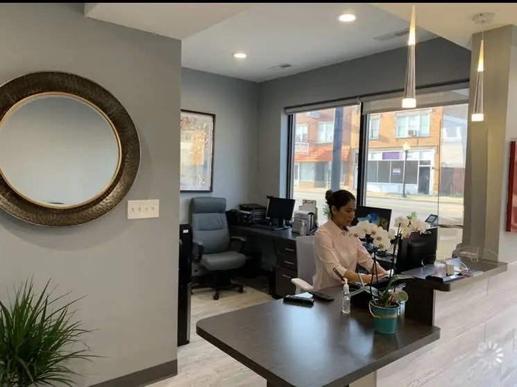 Olga A. Mendez DDS & Associates - Professional dental clinic exterior with modern facilities