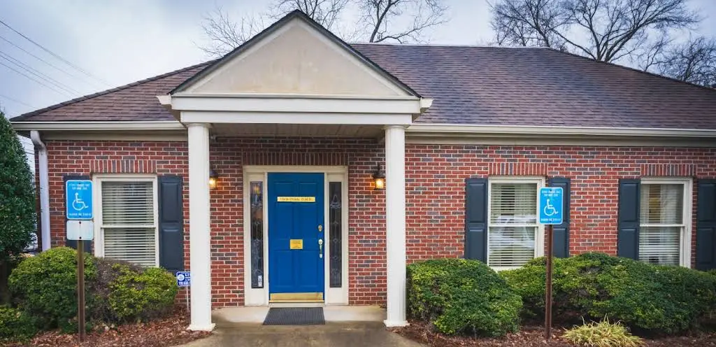 Chris Childs, DMD - Professional dental clinic exterior with modern facilities