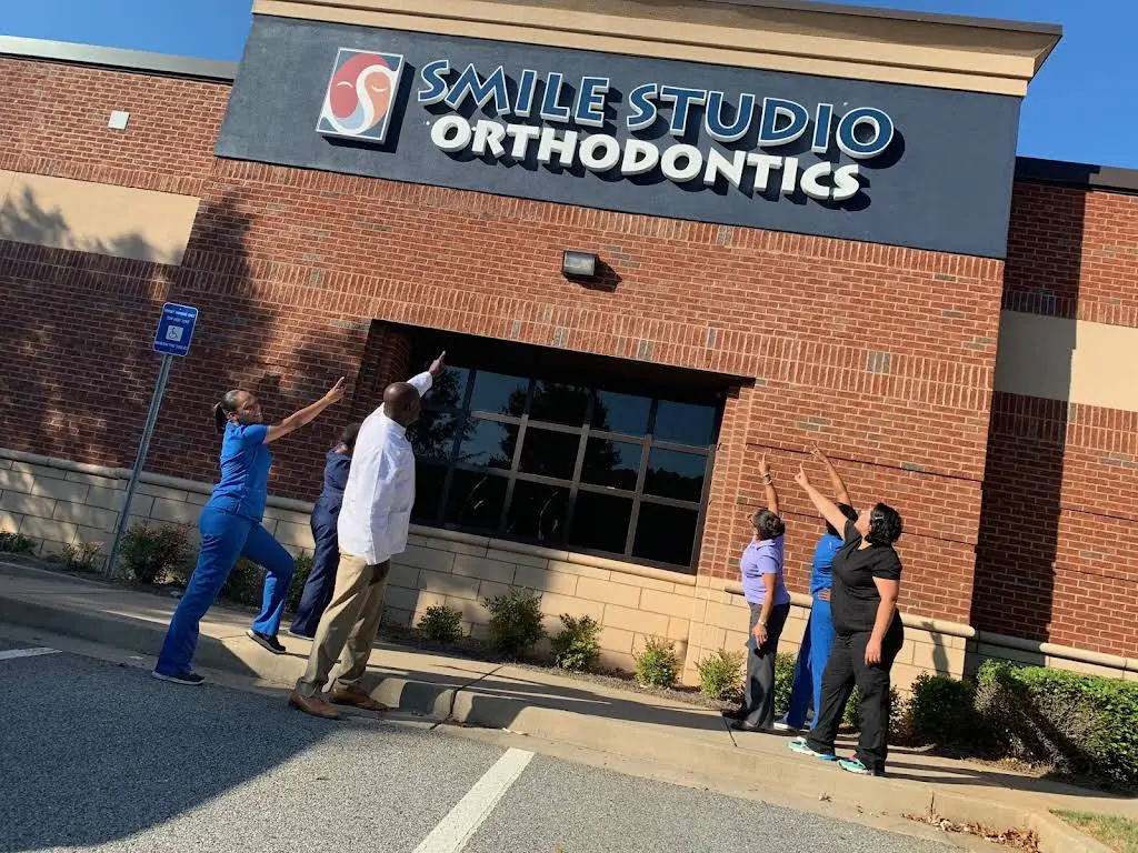 Smile Studio Orthodontics - Professional dental clinic exterior with modern facilities