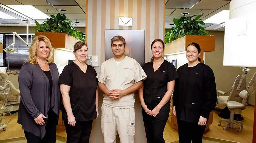 Dr. M. Shoaib Khan's Family & Cosmetic Dentistry Practice - Professional dental clinic exterior with modern facilities