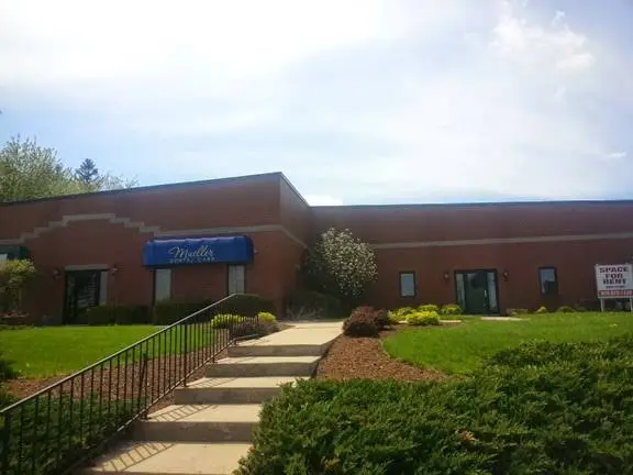 Mueller Dental Care - Heather Mueller, D.D.S. - Professional dental clinic exterior with modern facilities