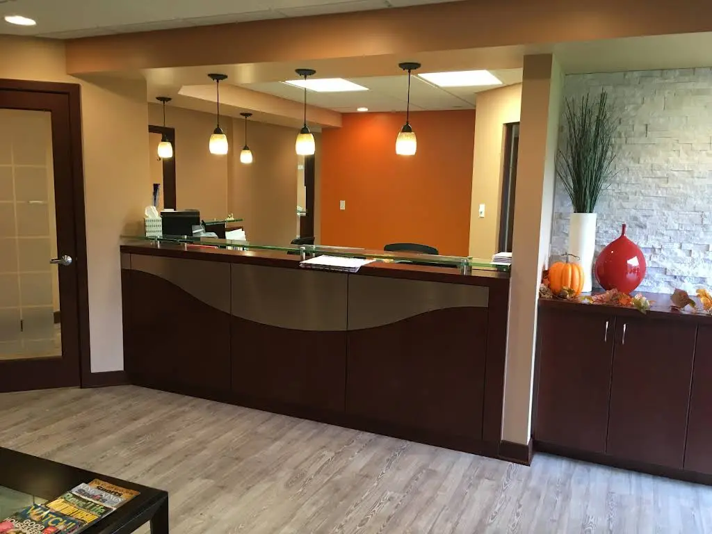 Aurora Dentrix - Professional dental clinic exterior with modern facilities